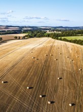 Straw bales in the Scottish fields from a drone, Southeast Scotland, UK