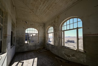 View into the desert from a former dwelling house, Kolmanskuppe, near Lüderitz, Karas Region,