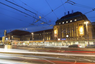 Street and tram tracks in front of the main station, tracers, blue hour, main station, Leipzig,