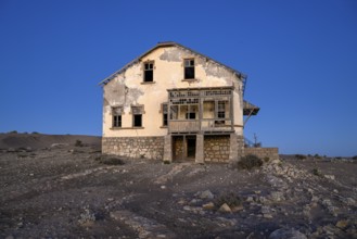 Dilapidated building in the desert sand, blue hour, Kolmanskop, near Lüderitz, Karas region,