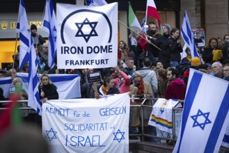 Numerous people gather for a vigil at the Hauptwache in Frankfurt am Main on the second anniversary