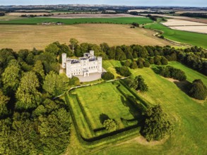 Wedderburn Castle and Barns over fields from a drone, Duns, Berwickshire, Scotland, UK