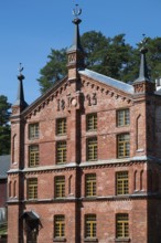 Brick façade with inscription 1893, former paper factory and mill for the production of groundwood