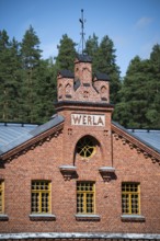 Brick façade with inscription Werla, former paper factory and mill for the production of groundwood