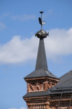 Decorated iron tower helmet, former paper factory and mill for the production of groundwood pulp