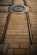 Rails and switch for transporting cardboard, former paper factory and mill for the production of