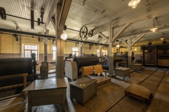 Factory hall with historical machines for the production of cardboard and paper, former paper