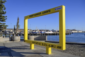 Frame for souvenir photos at the waterfront, Robert Harbour, Lüderitz, Karas Region, Namibia