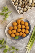 Organic non dairy banana and soy milk in clay cup on brown wooden background. Vegan healthy food