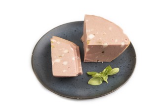 Mortadella sausage on plate with pepper and herbs isolated on white background. Side view