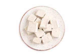 Coffee marshmallow isolated on white background. top view, flat lay, close up