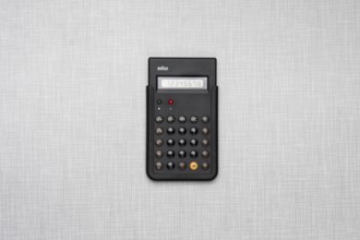 Top Shot, replica ET66 pocket calculator from Braun, designed by Dieter Rams