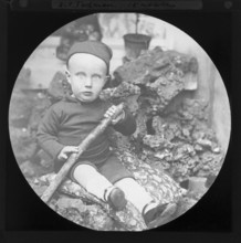 Family portrait of 15 month old boy photographed c 1900, England, UK - J C Todman