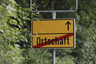 Instead of the usual place name sign, a replacement place name sign has been installed in the