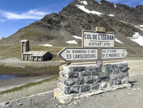 In the foreground signpost to the pass summit of the highest passable 2764 2770 metre high Alpine