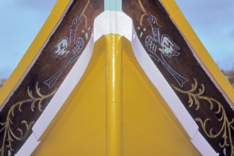Part of bow of fishing boat with typical colourful painting for Maltese fishing boats, Valletta,