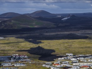 Lava, lava field, village, houses, summer, cloudy, sunny, aerial view, volcanic eruption, July