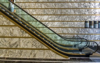 Escalator in the foyer of the Meoclinic, private practices in Friedrichstraße, Berlin, Germany