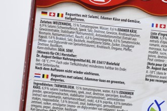 Germany - September 2025: Ingredient list in German on frozen salami baguette packaging