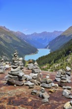 Hiking area below the Gepatsch Glacier in the Kaunertal with red rocks and the Kaunertal reservoir