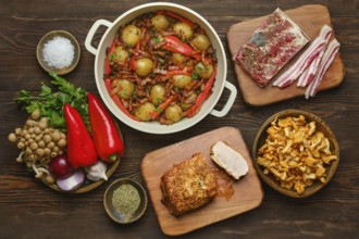 Organic ingredients on a rustic wooden countertop, showcasing a hearty meal preparation with fresh
