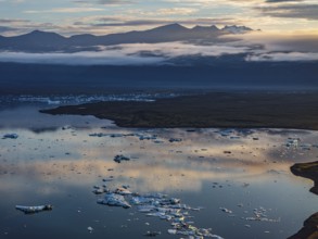 Ice floes, glacier, glacier tongue, fog, clouds, morning mood, mountains, reflection, aerial view,
