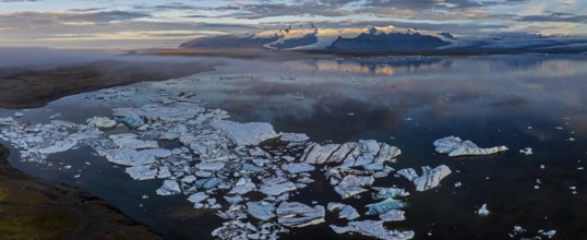 Ice floes, glacier, glacier tongue, fog, clouds, morning mood, mountains, panorama, reflection,