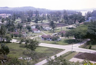 View over houses in coastal area near Mersing, Johor, Malaya, Malaysia, south east Asia 1964