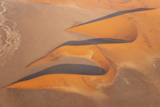 Sand dunes in the Namib Desert. In the evening. Aerial view. Namib-Naukluft Park, Namibia
