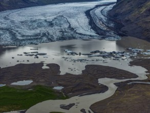 Glacier, glacier tongue, glacier lake, mountains, cloudy, aerial view, panorama, summer,