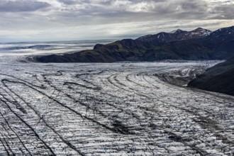 Glacier, crevasses, ice, aerial view, black ice, climate change, summer, mountains,