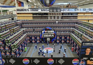 Football stadium built from beverage cans for the European Women's Championship in the supermarket,