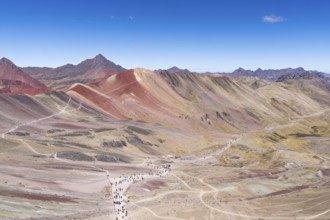 Vinicunca, colourful mountains in the background, in the Peruvian Andes, Cusipata district, Cusco,
