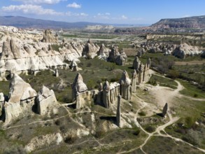 Wide rocky backdrop with outstanding geological formations in Cappadocia, aerial view, Love Valley,