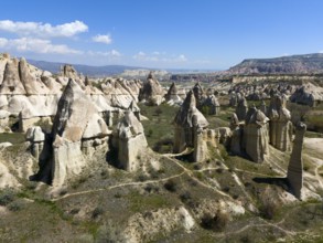 Rock formations and a breathtaking natural panorama in Cappadocia, aerial view, Love Valley, Göreme