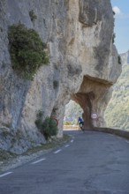 Road and rock arch, Gorges de la Nesque, Vaucluse, Provence-Alpes-Cote dAzur, South of France,