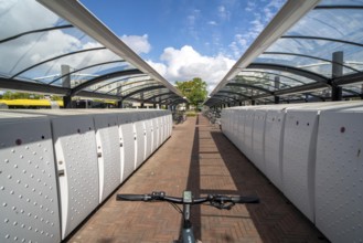 Bicycle parking spaces and boxes on the cycle path in the east of Utrecht, at Utrecht-Lunetten