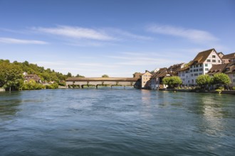 The historic wooden bridge over the Rhine was opened in 1816 and connects the German municipality