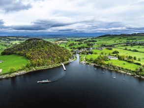 Farms and mountains over Ullswater Lake from drone, Pooley Bridge, Lake District National Park,
