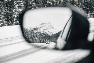 Winter road trip on the Icefields Parkway with lots of snow and ice, Banff National Park, Jasper
