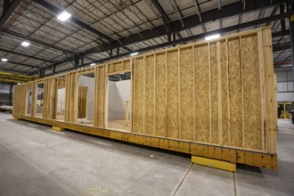 Romulus, Michigan - Workers build apartments in Ginosko Modular 's factory using modular