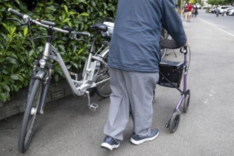 Senior citizen with walking aid, Interlaken, Bern, Switzerland