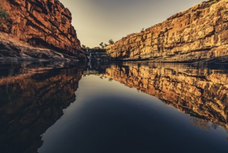 Bell Gorge waterfall, a body of water in north-west Australia in the Kimberley. Sunrise in the