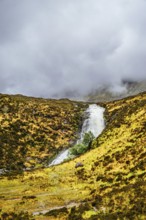 Eas a' Bhradain waterfall, Red Cuillin mountains, Loch Ainort, Isle of Skye, Scotland, UK