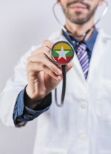 Myanmar health and medical insurance concept. Myanmar healthcare system, doctor holding stethoscope