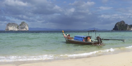 Longtail boat on the beach, Koh Ngai Island, Andaman Sea, Satun Province, Southern Thailand,