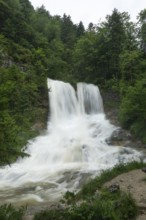 Magical waterfalls in the Weißbachtal valley near Inzell after heavy rain