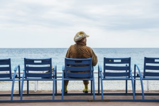 Woman on the promenade, Nice, Alpes Maritimes, Provence Alpes Cote d'Azur, French Riviera, South of
