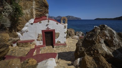 Legend, Crab, Mussel fisherman, Stony terrace in front of a chapel with red roof by the sea,