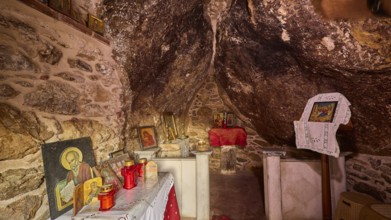 Legend, crab, mussel fisherman, interior of a rock chapel with religious icons and candles, chapel,